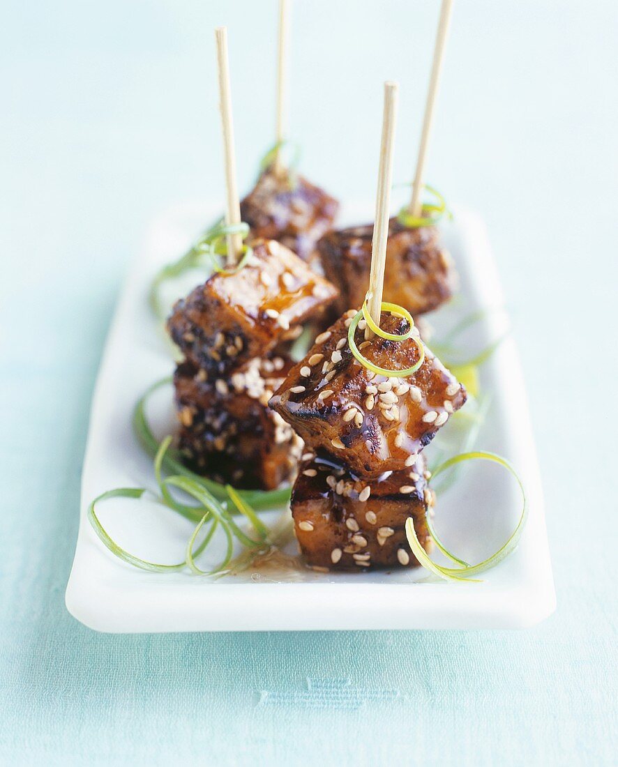 Honey and soy glazed tofu on bamboo skewers (Kushi, Japan)