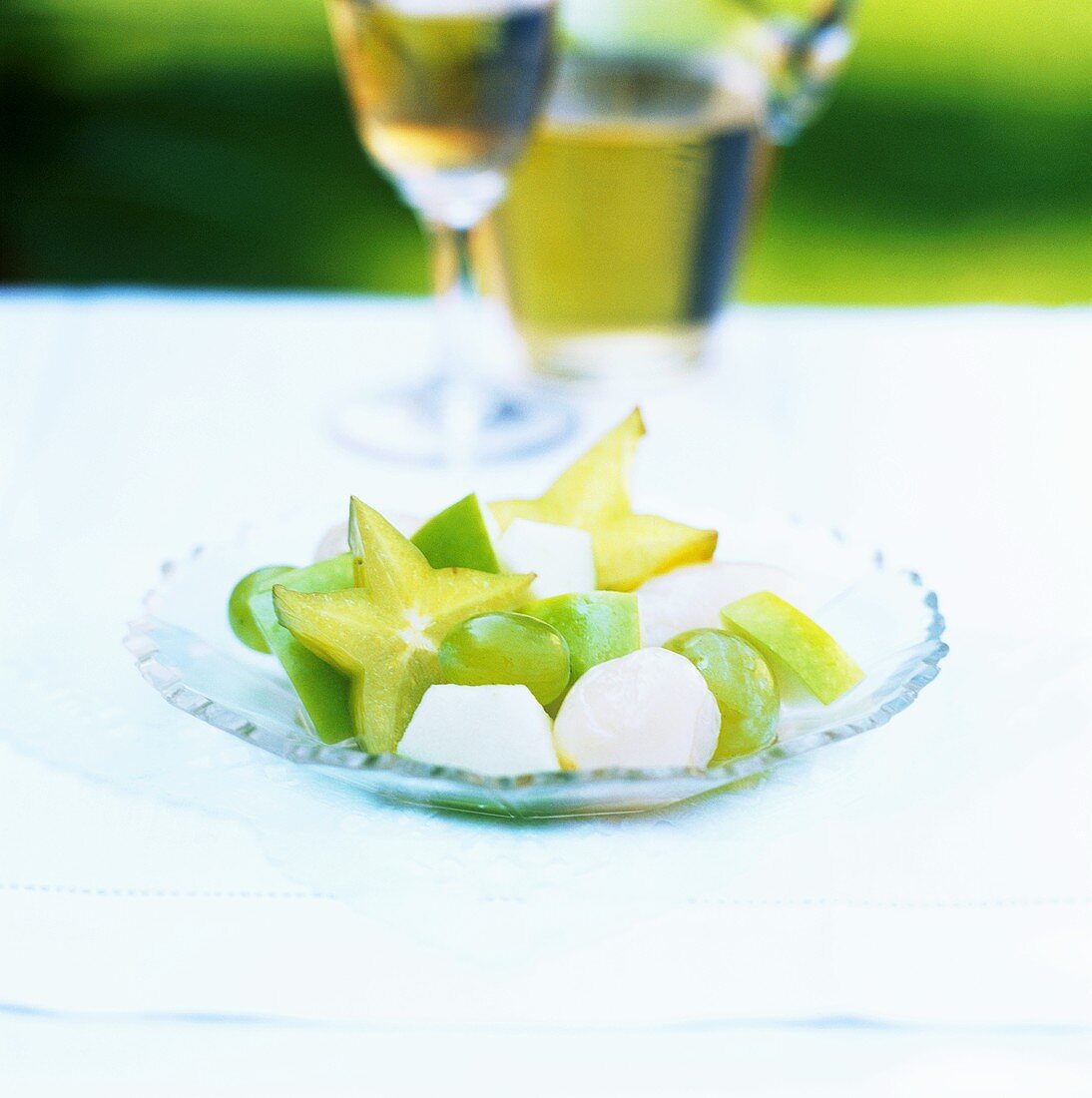 Fruit salad with star fruit, grapes, lychees and apple