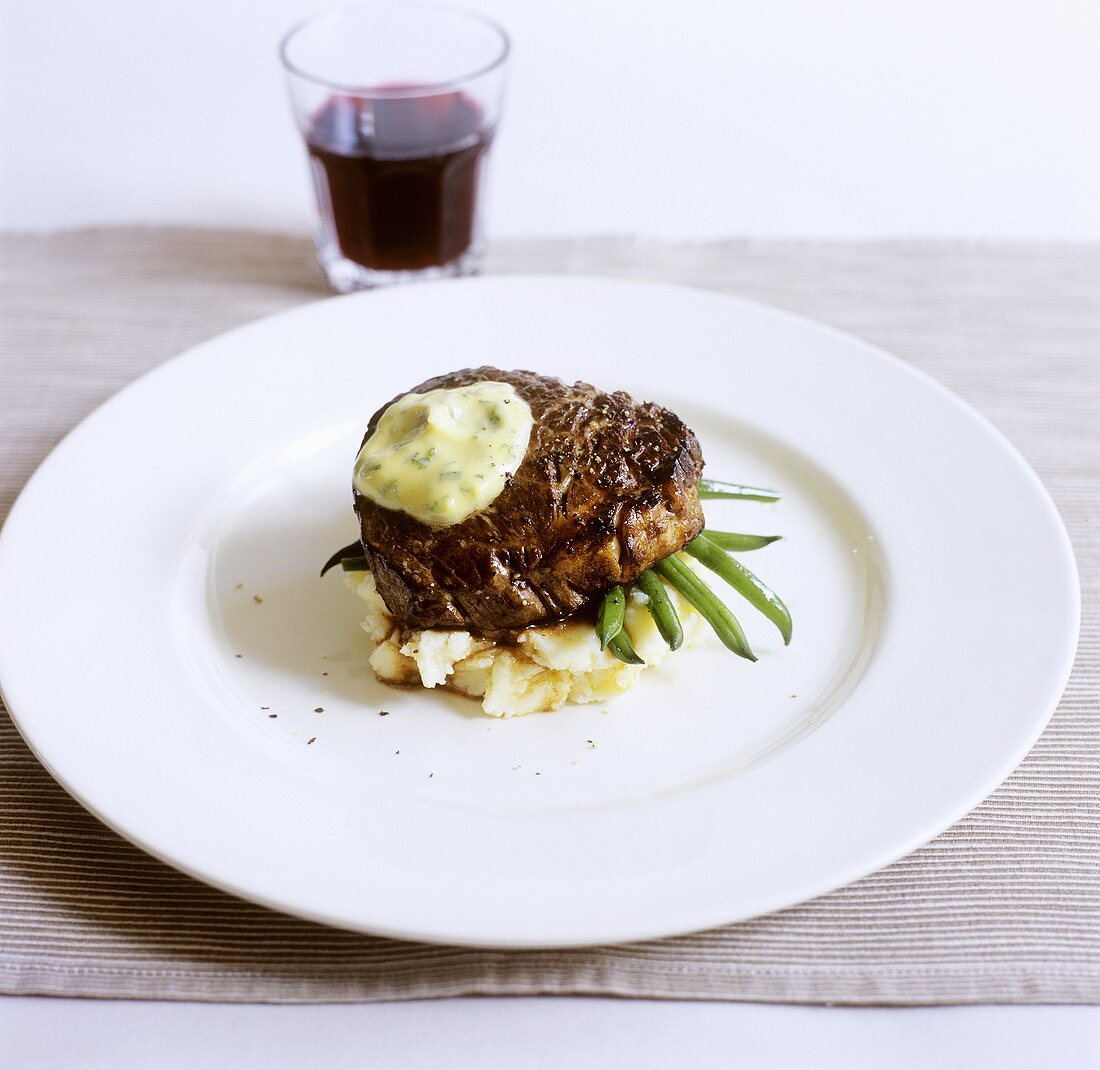 Beef steak with green beans and mashed potato