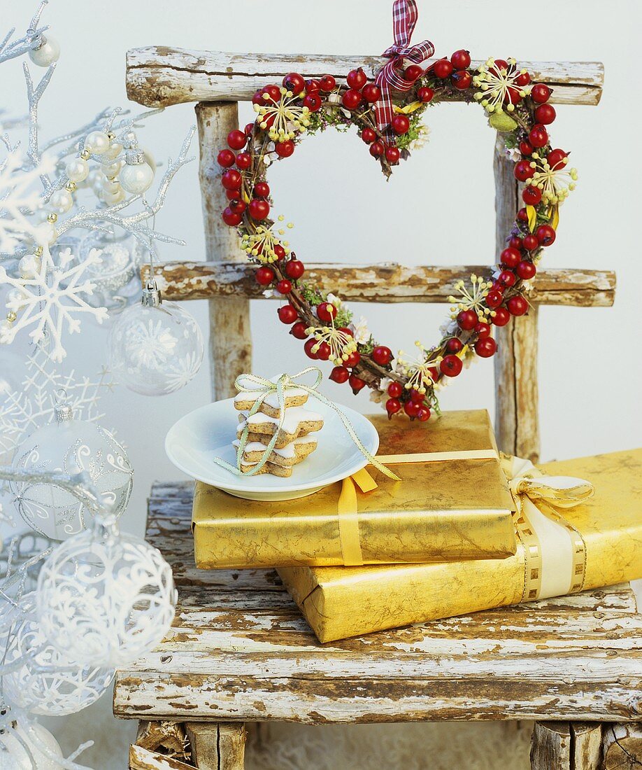 Cinnamon stars, Christmas gifts & wreath of holly berries