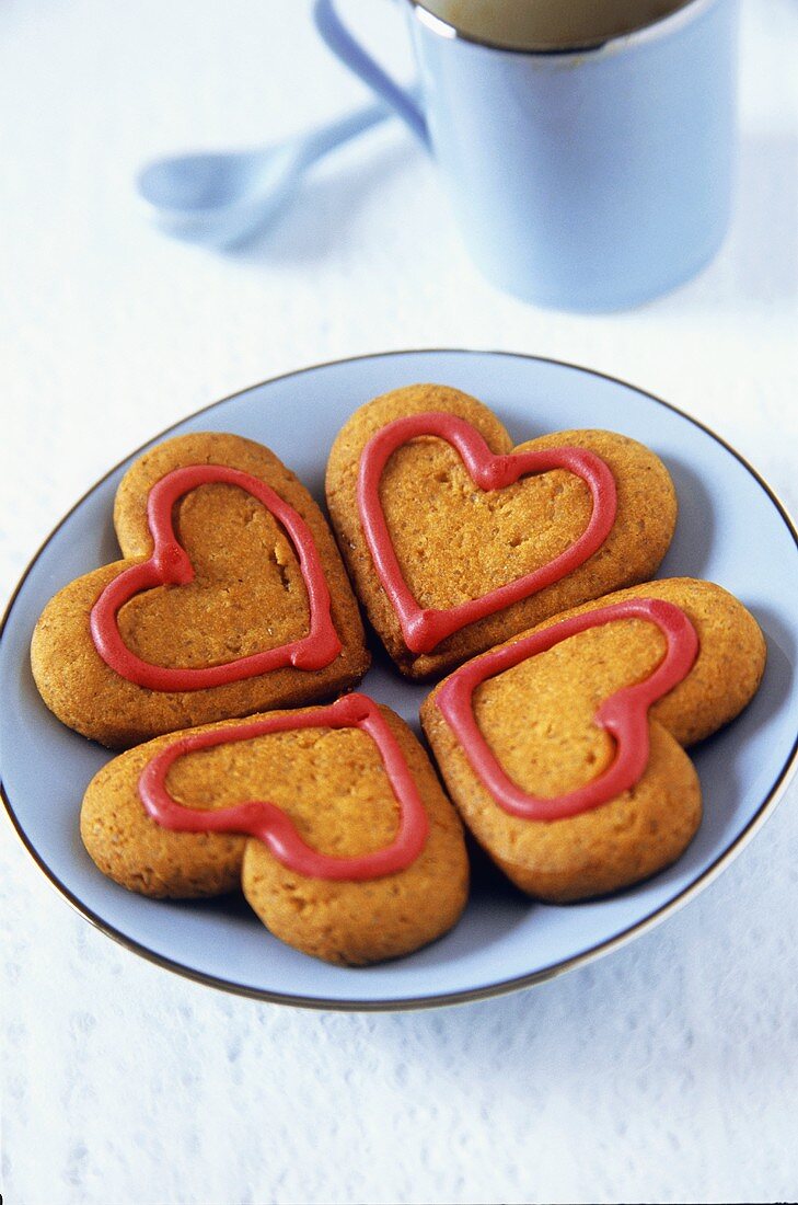 Heart-shaped biscuits decorated with icing