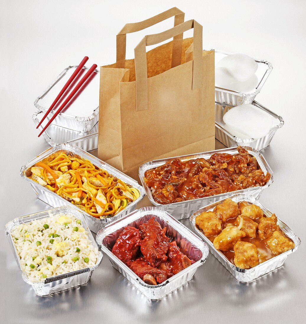 Take-away food: several dishes in aluminium containers