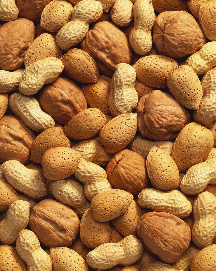 Unshelled peanuts, walnuts and almonds (full-frame)