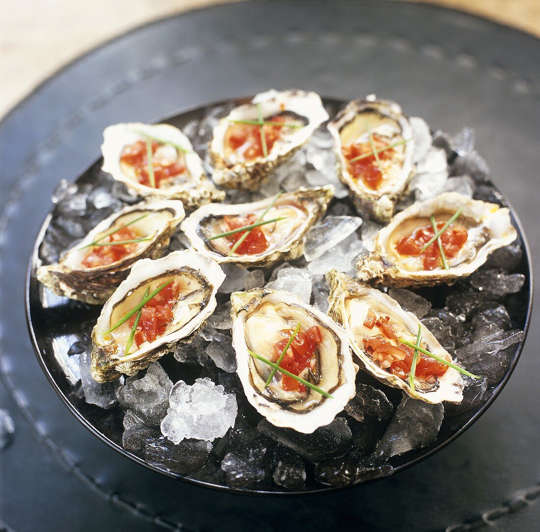 Oysters with chilli salsa on ice