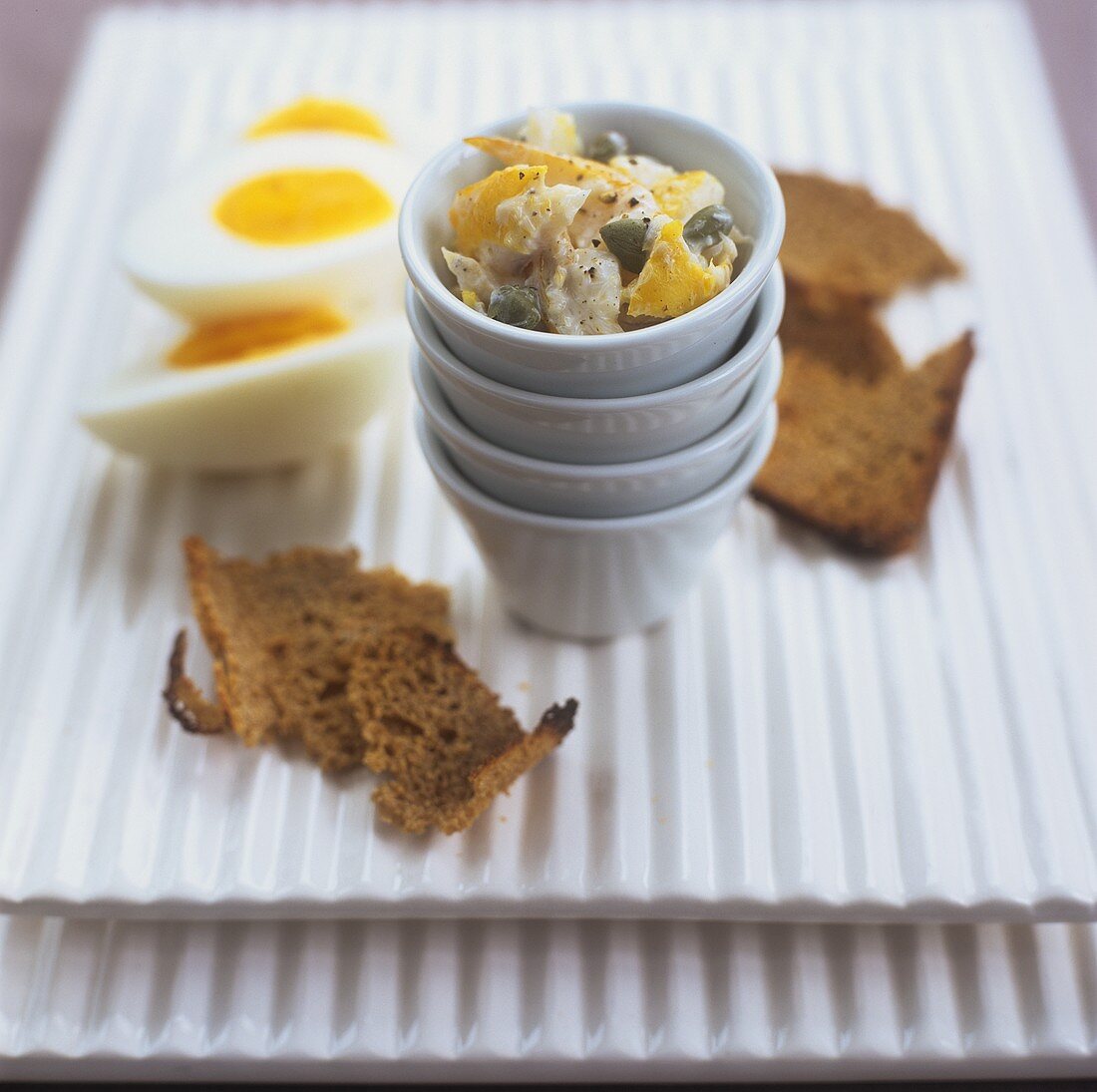 Smoked fish pâté, black bread and boiled eggs