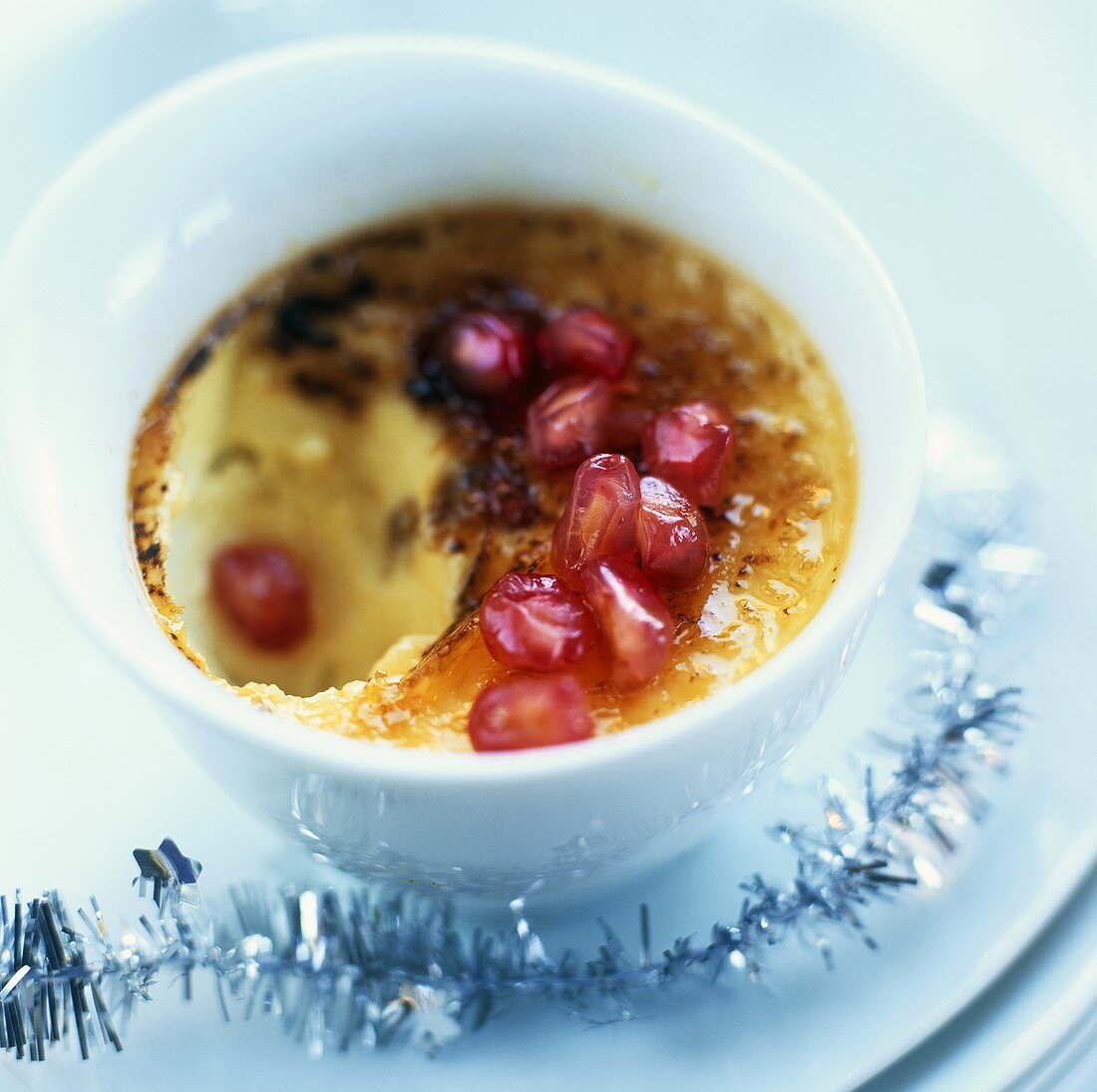 Crème brûlée with pomegranate seeds