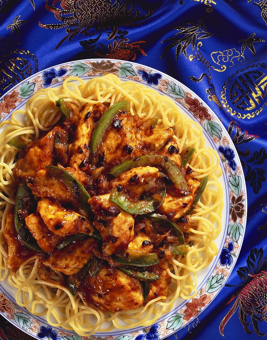 Chicken with black beans on Chinese egg noodles