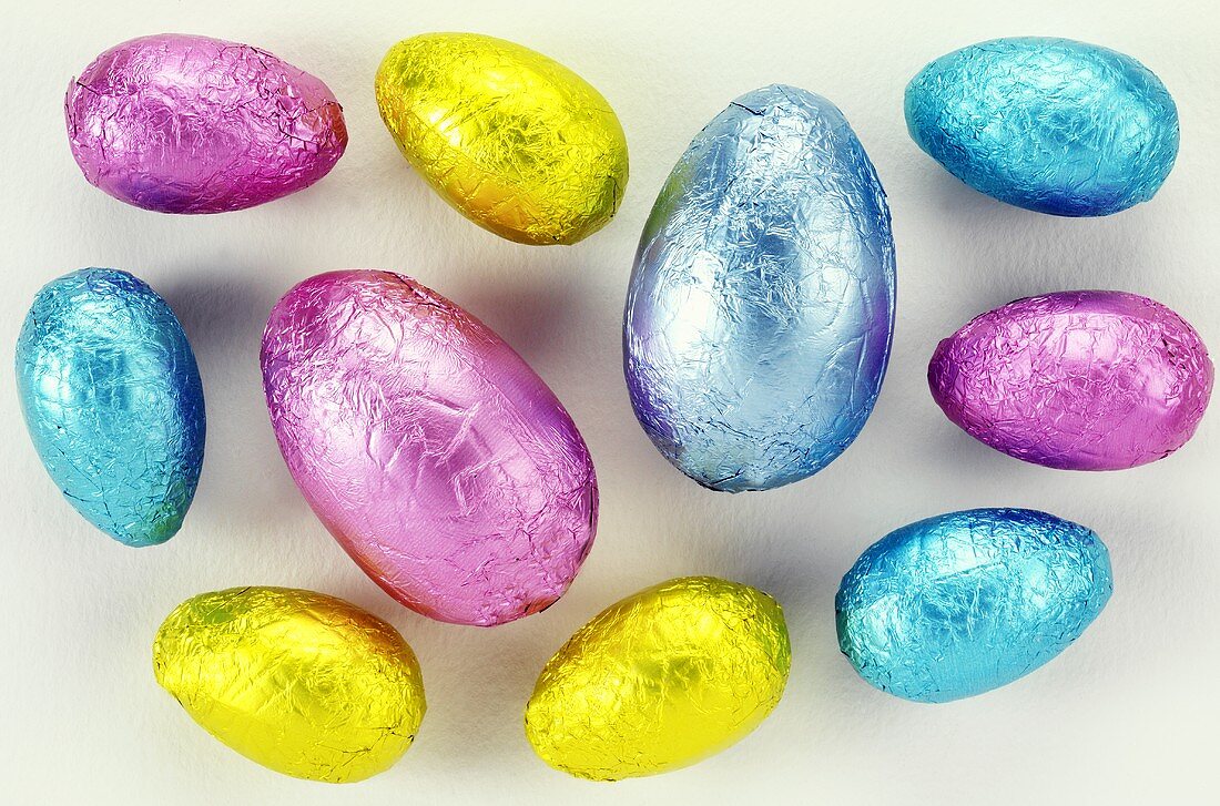 Ten chocolate Easter eggs in coloured foil