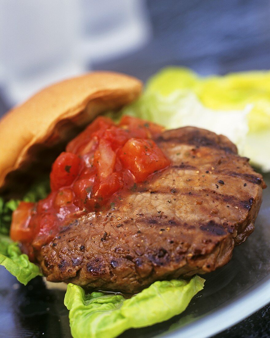 Steak burger with tomato salsa
