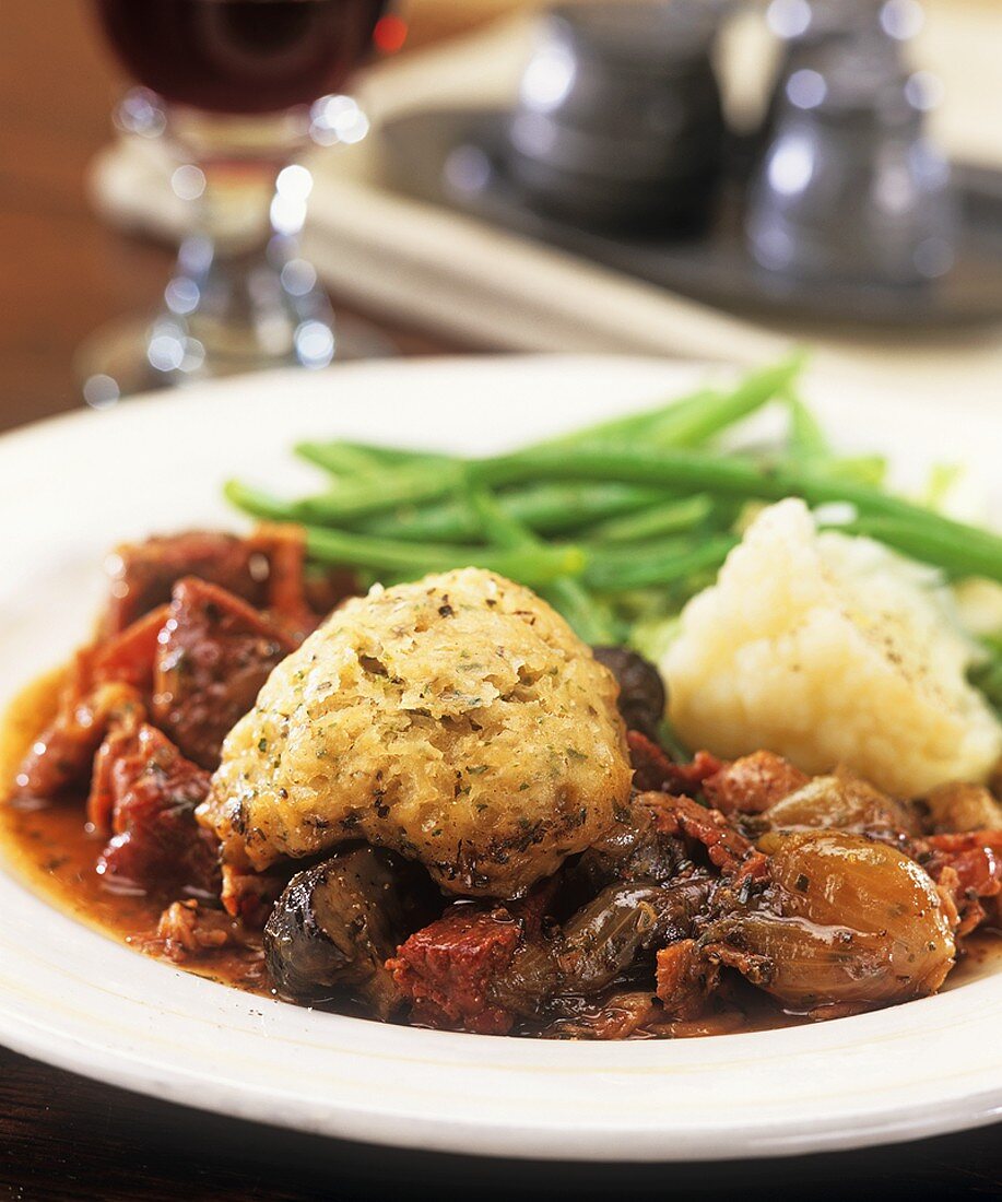 Beef casserole with dumpling and vegetables