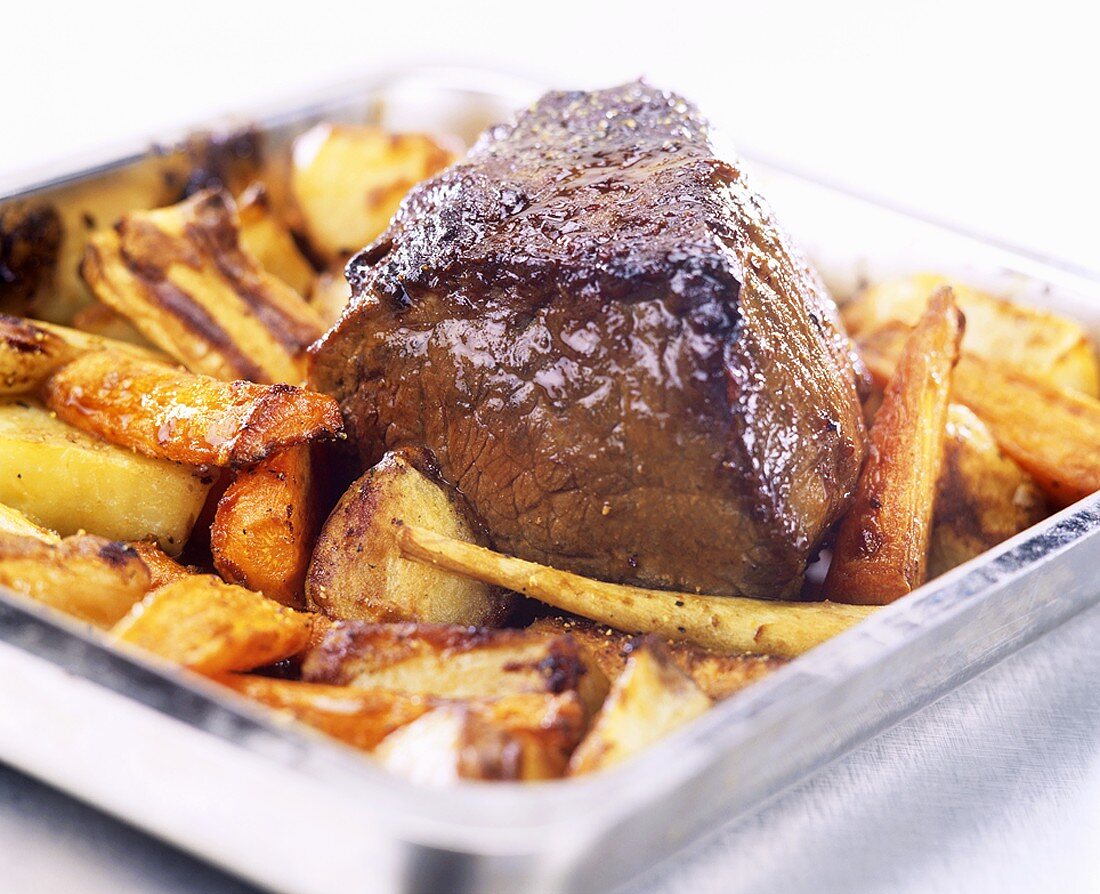 Honey-glazed roast beef with vegetables