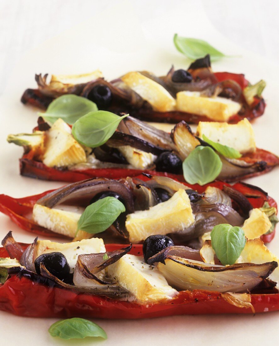 Red peppers stuffed with goat's cheese, onions and olives