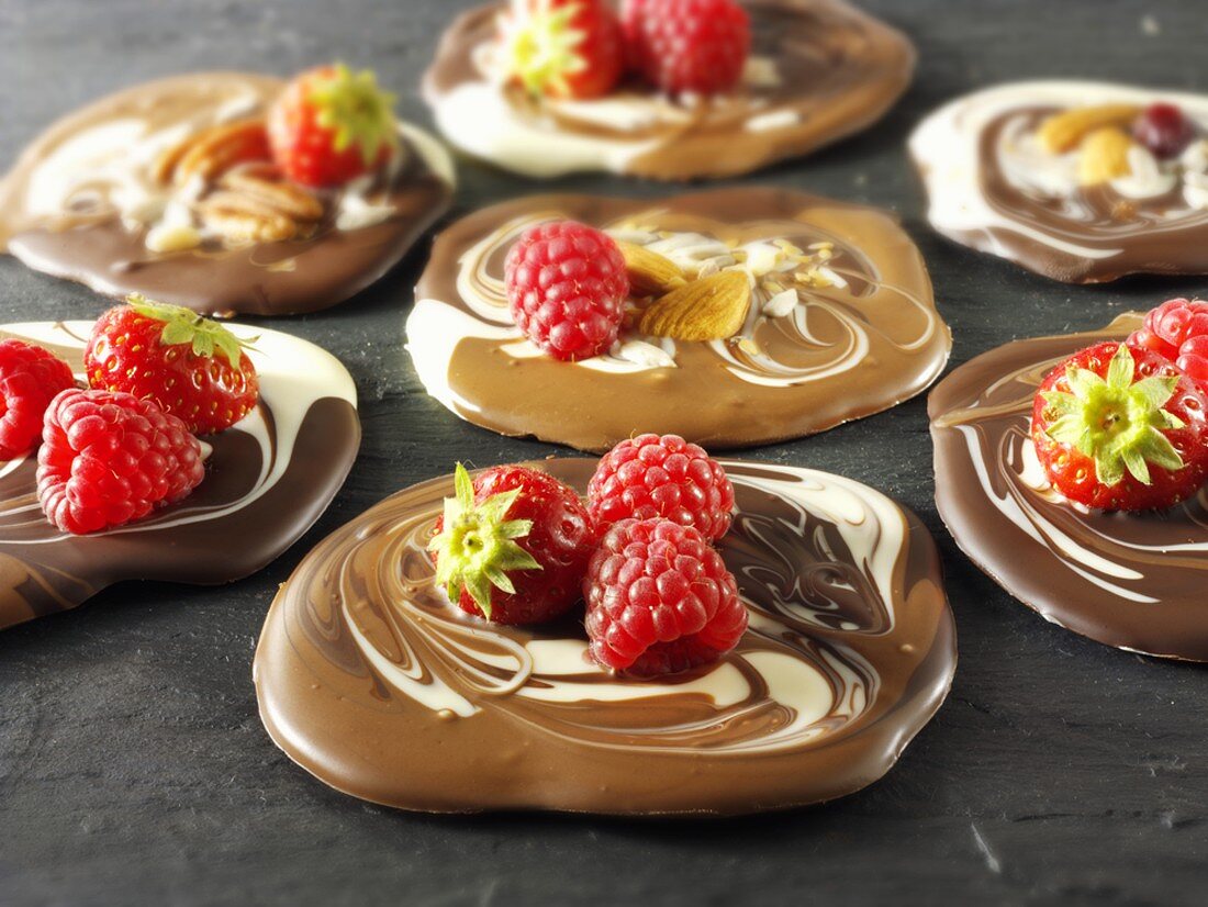 Marbled chocolate rounds with strawberries and raspberries