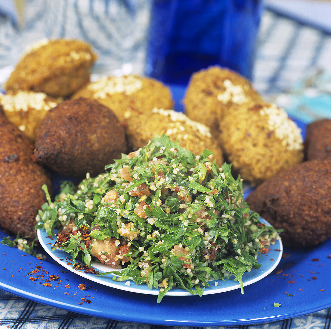 Lebanese appetisers: tabbouleh, falafel and kibbeh