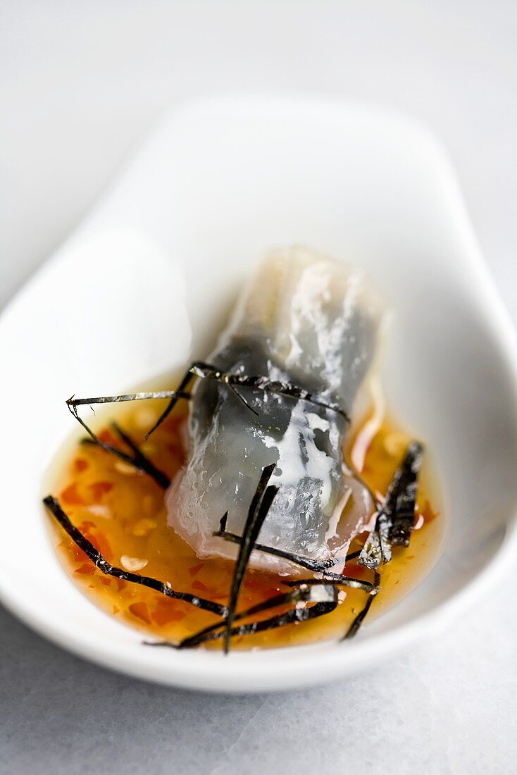 Fish dumpling wrapped in seaweed with sweet and sour sauce