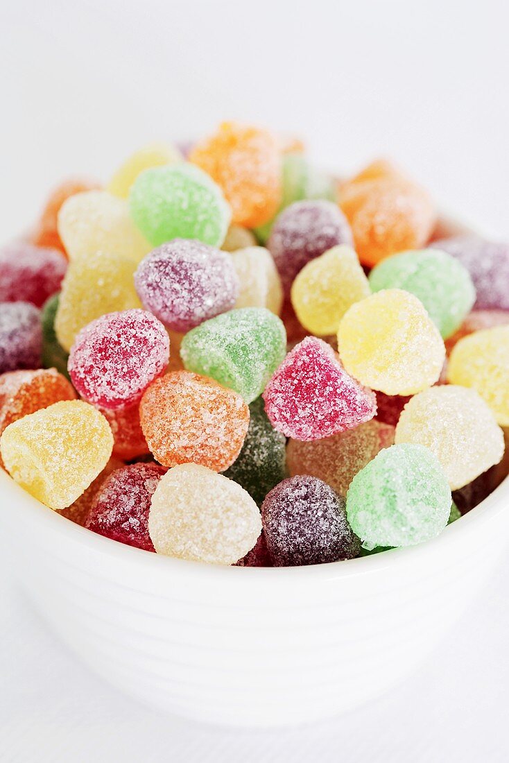 Coloured sugar-coated jelly sweets in a small bowl