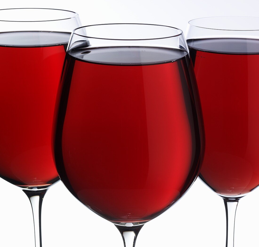 Red wine in three glasses