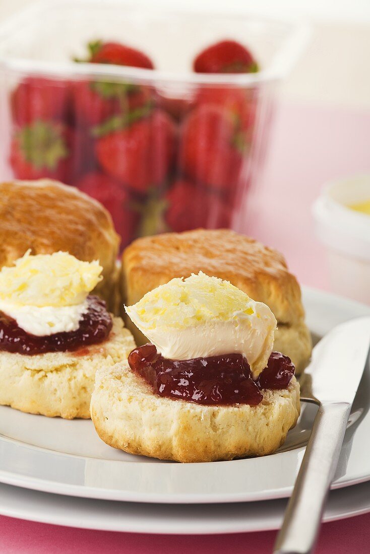Scones with clotted cream and jam (UK)