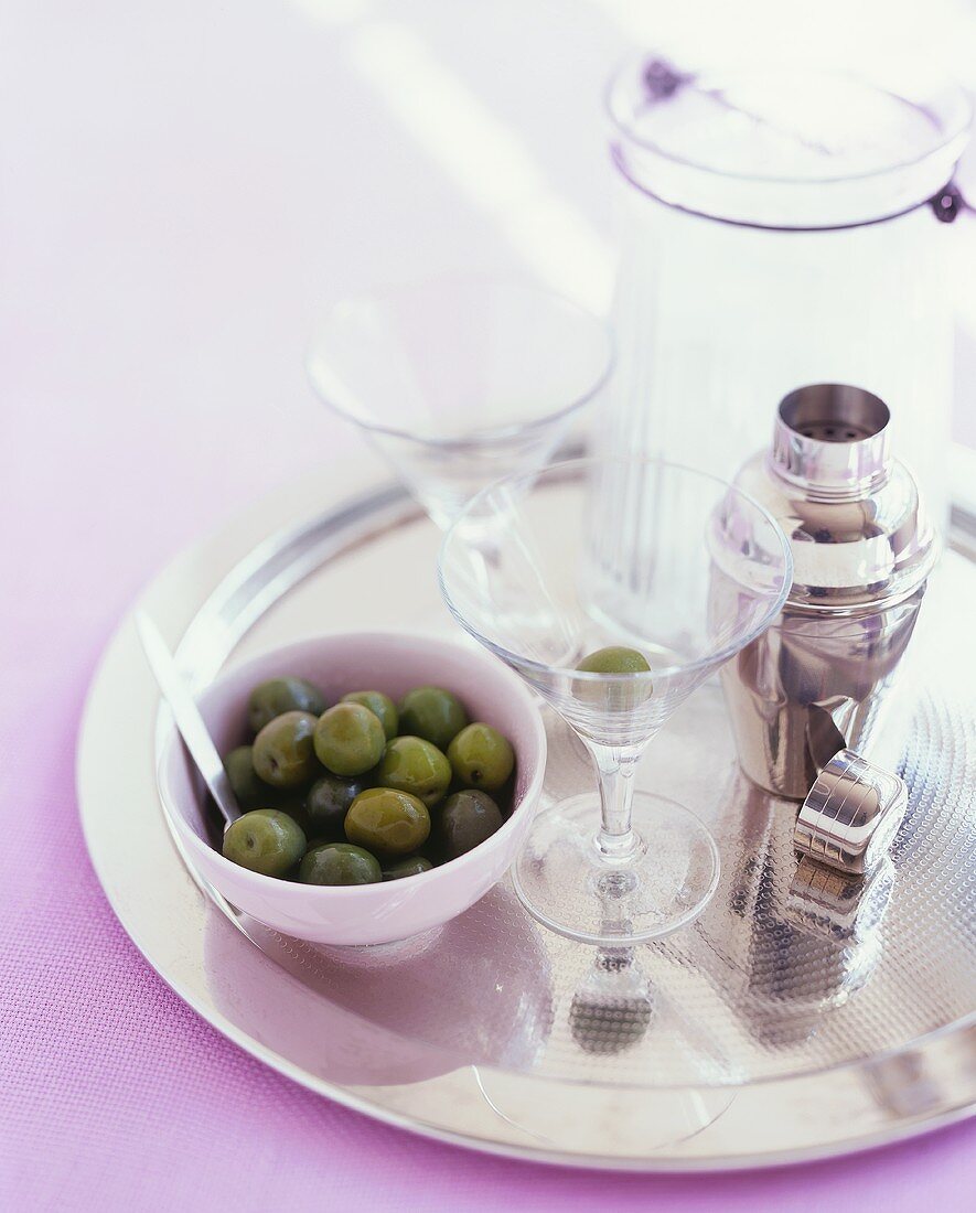 Olives, Martini glass and cocktail shaker