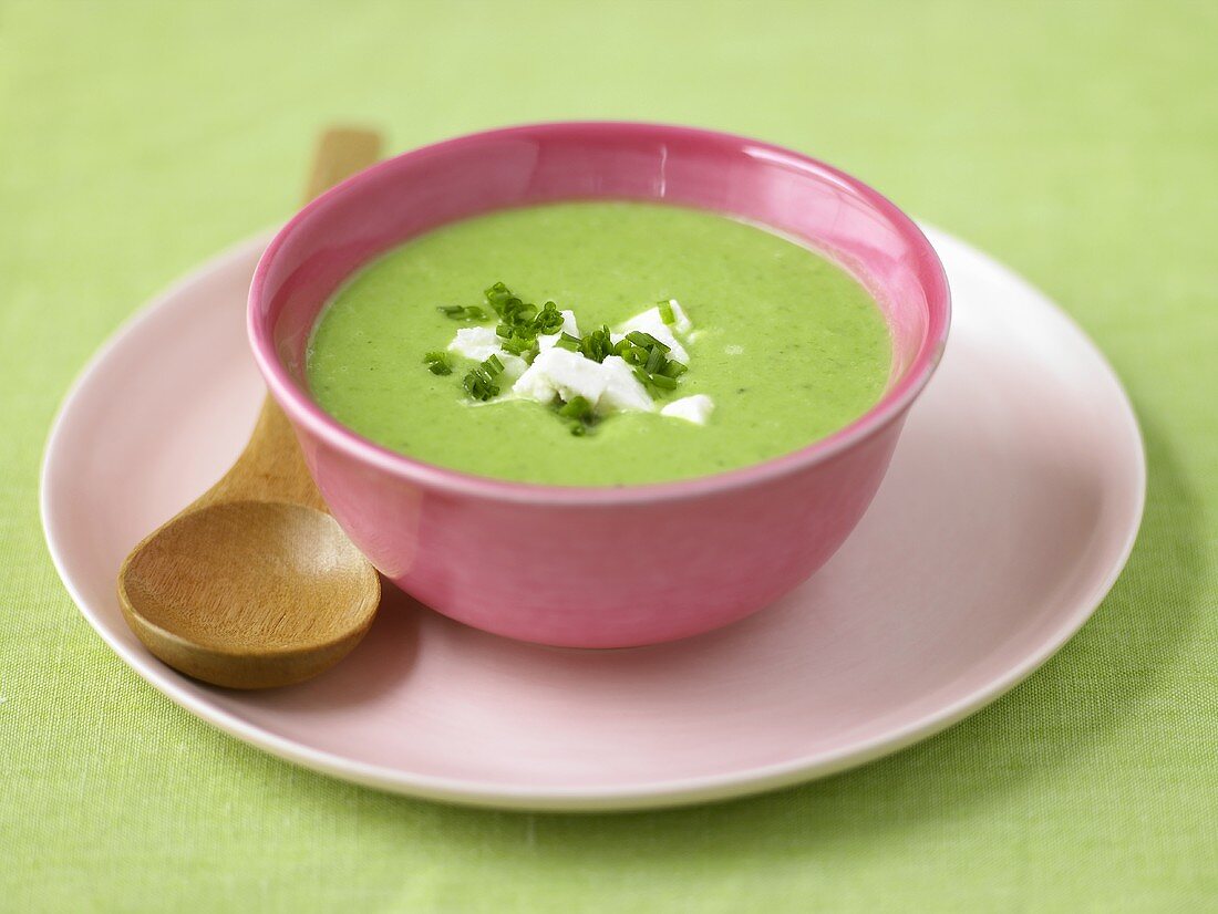 Pea and asparagus soup with feta and chives
