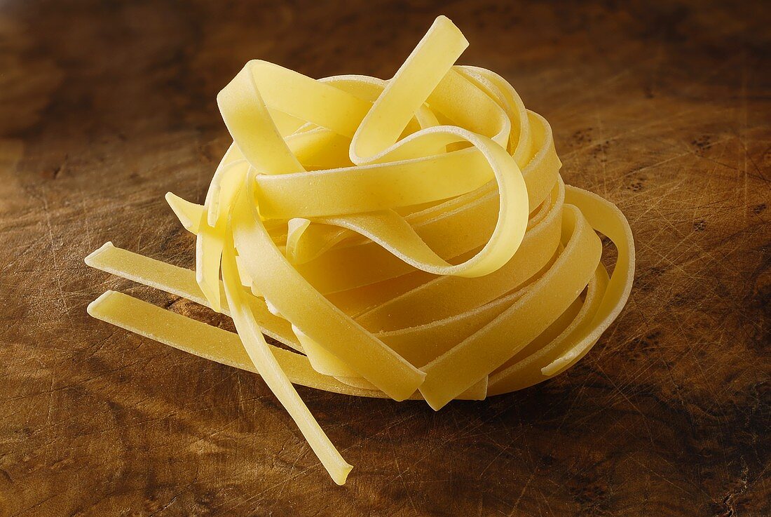 Nest of dried ribbon pasta