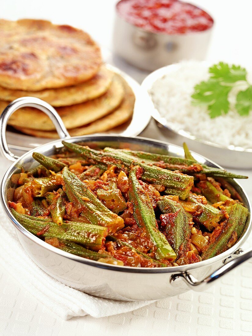 Okra curry (India) with flatbread and rice