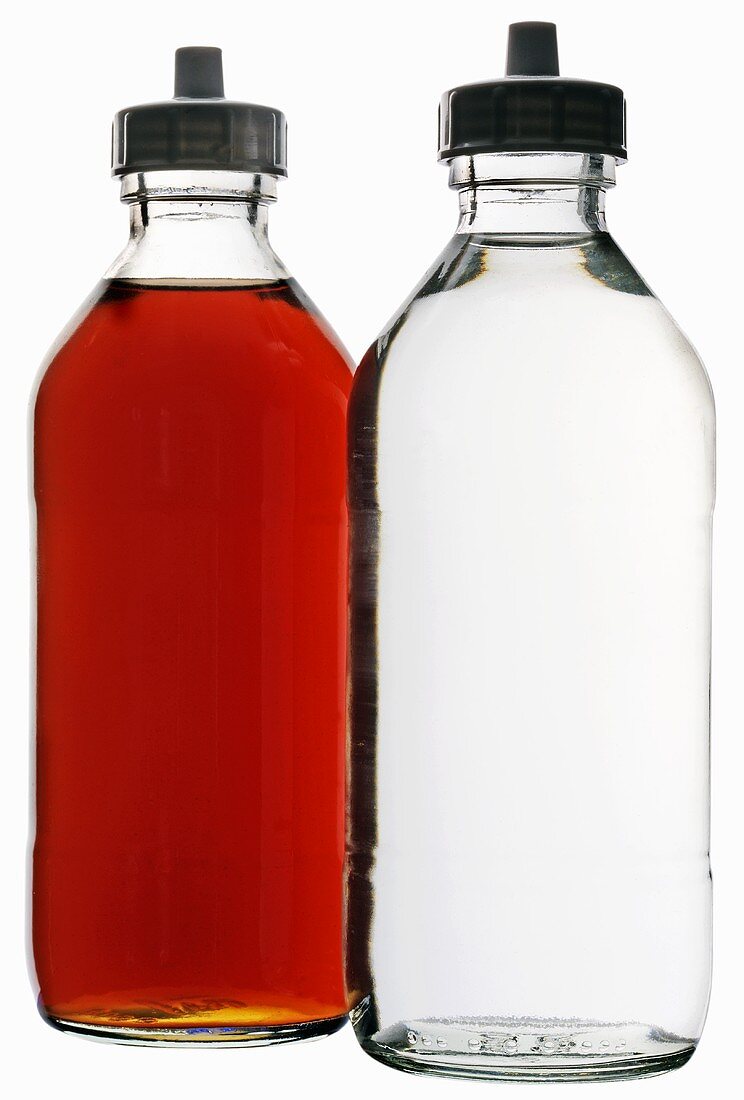 White- and red wine vinegar in bottles