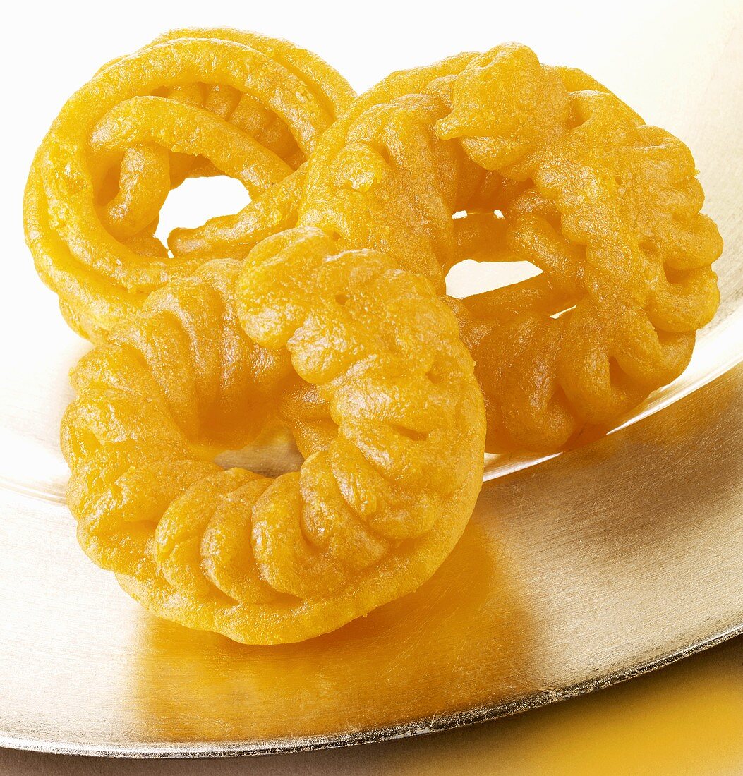 Jalebis (süsse frittierte Teigspiralen, Indien)