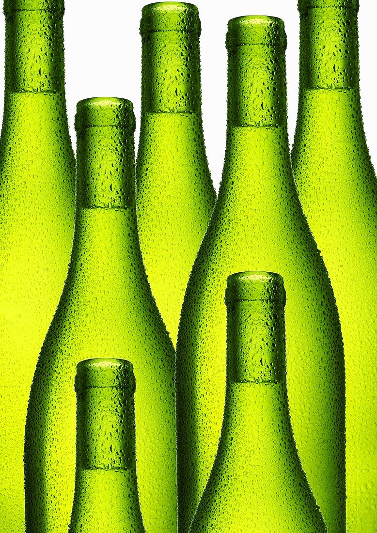 White wine in green bottles