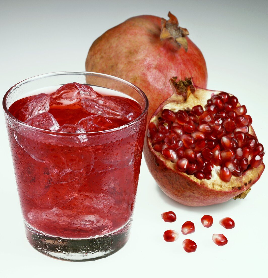 Pomegranate juice with ice cubes