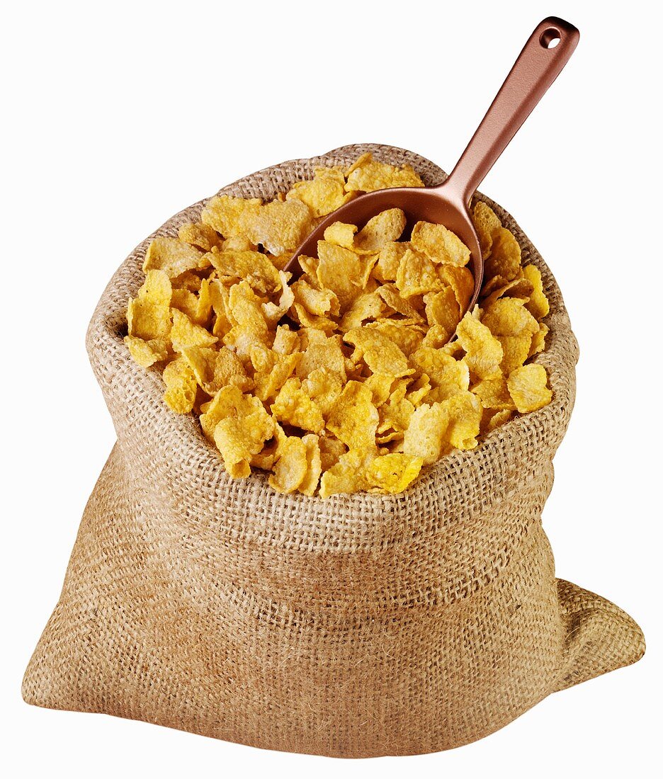 Cornflakes in einem Jutesack mit Schaufel