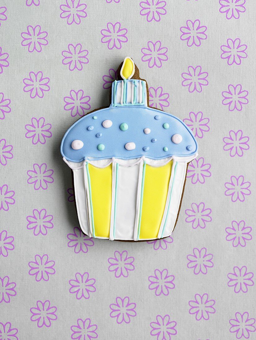 Iced cake in the shape of a cupcake