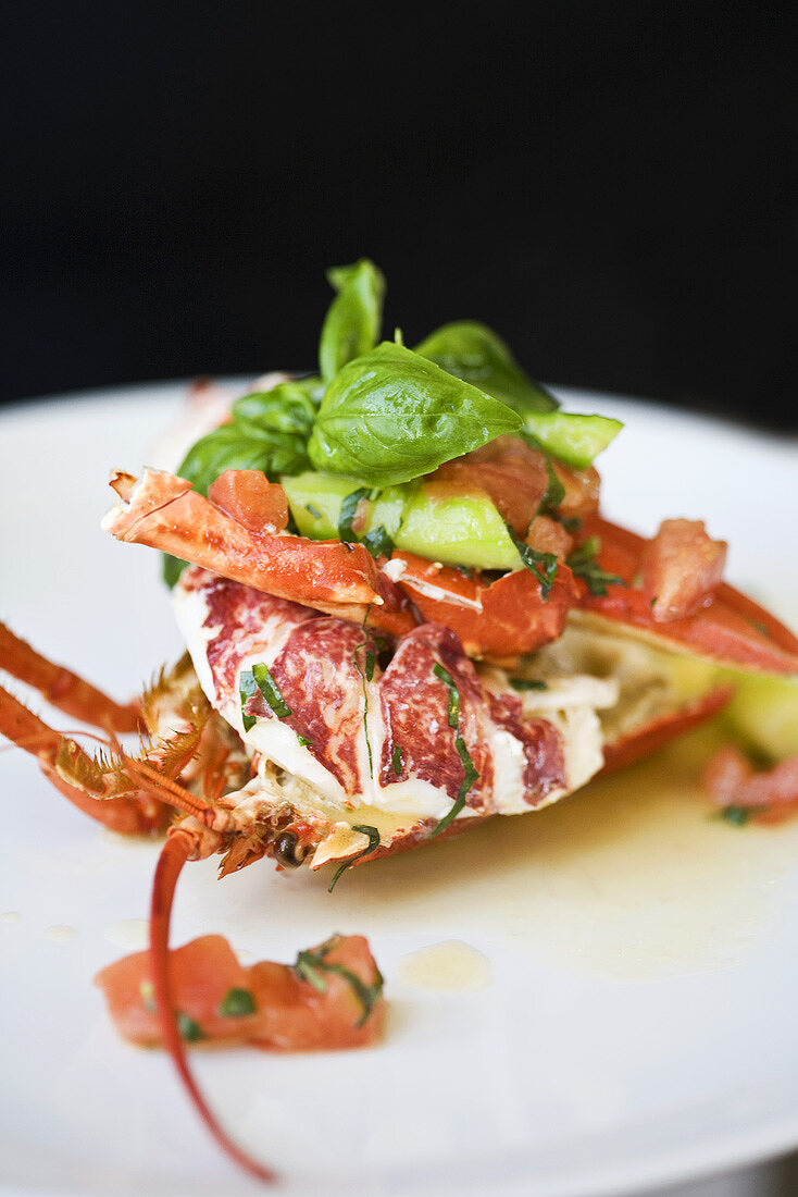 Lobster with cocktail tomatoes, leeks, asparagus and basil