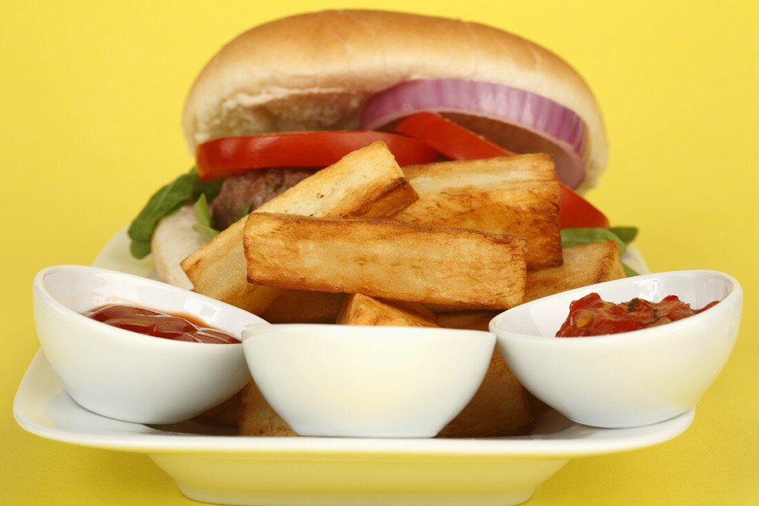 Burger with chips and three dips