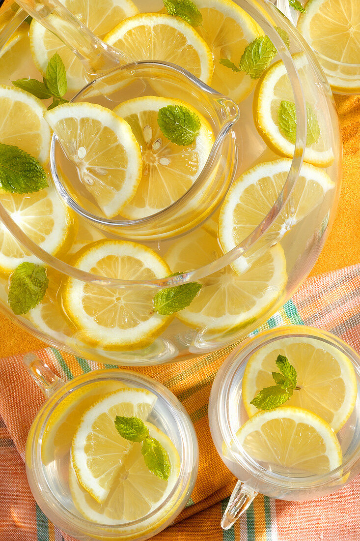 Lemonade in punch bowl and glasses