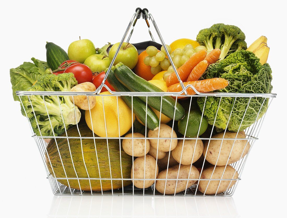 Shopping basket full of fruit and vegetables