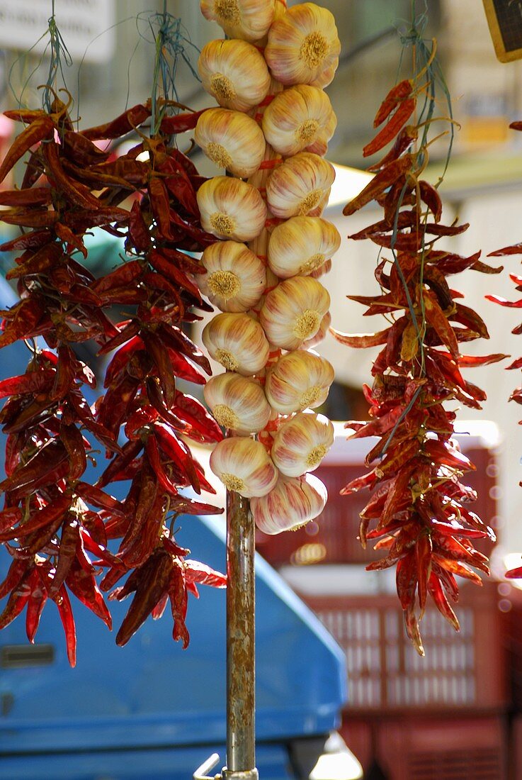 Dried chillies and garlic plait on a market stall