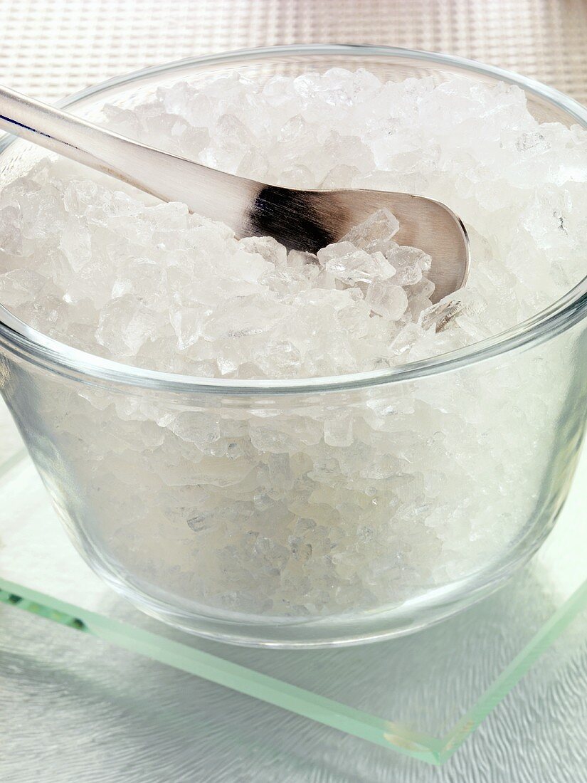 Coarse lemon salt in a glass bowl