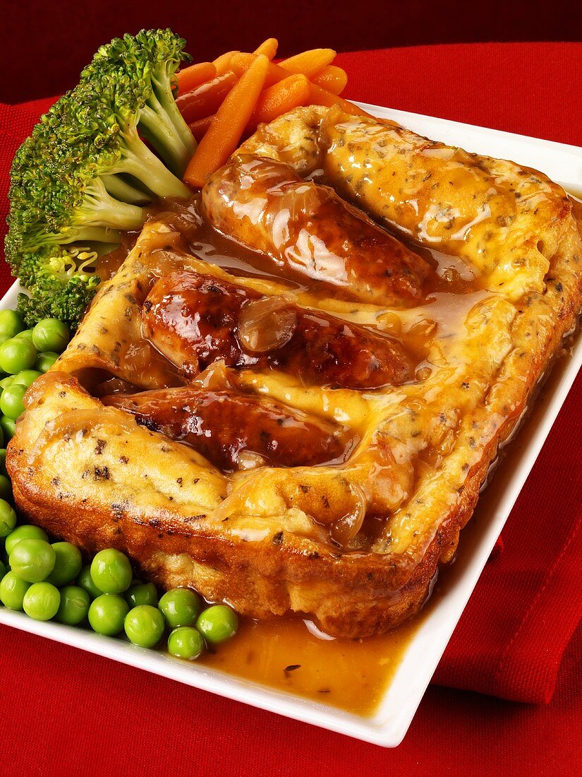 Toad-in-the-hole with vegetables and gravy