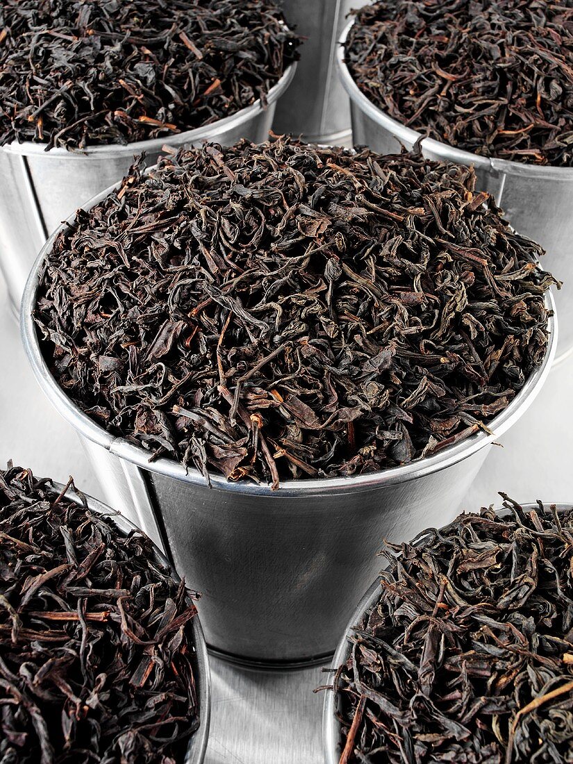 Tea leaves in buckets