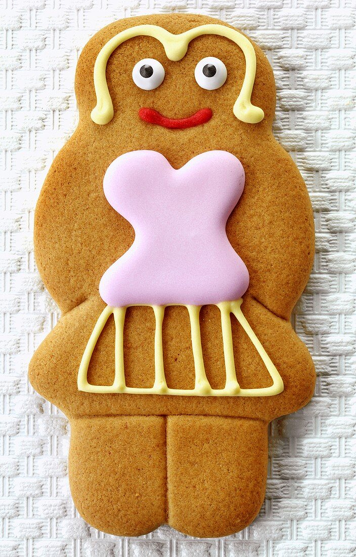 A gingerbread woman decorated with icing