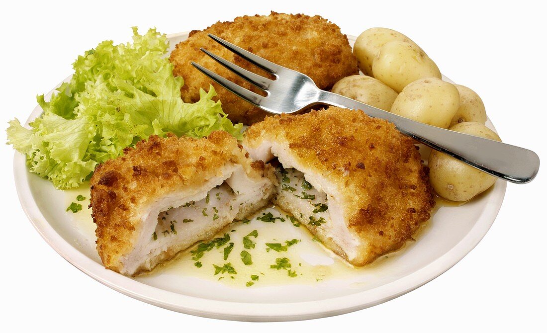 Chicken Cordon Bleu with herbs, garlic and potatoes