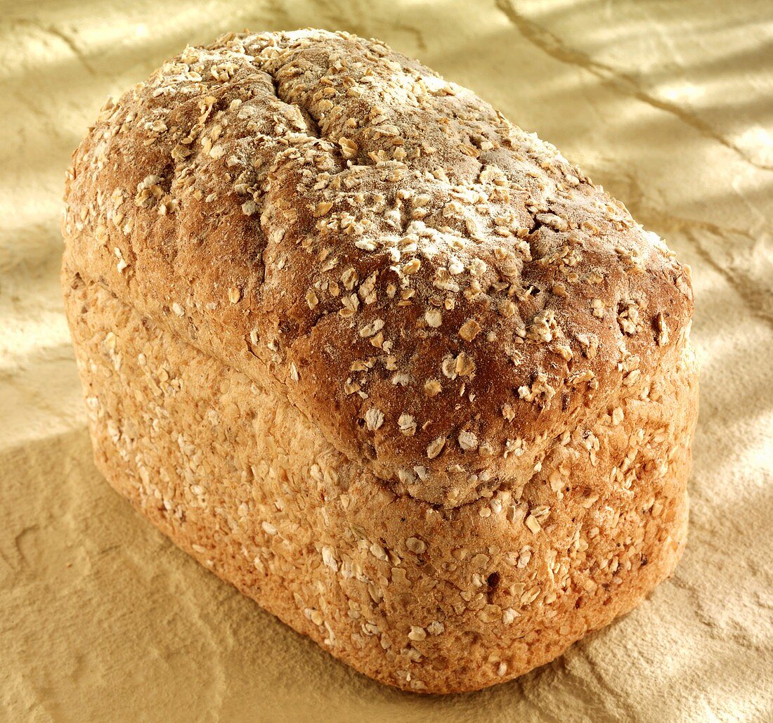 A loaf of oat bread on wholemeal flour