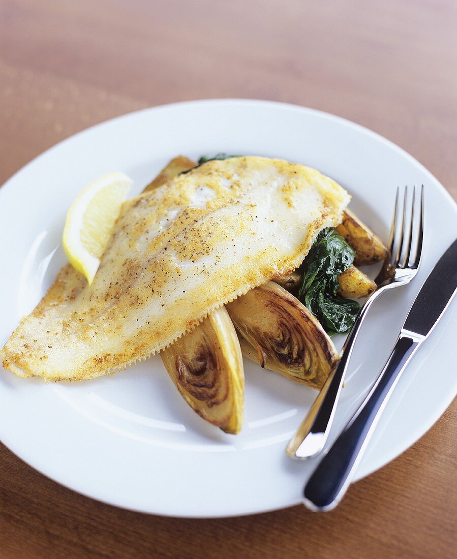 Fried sole on caramelised chicory with spinach