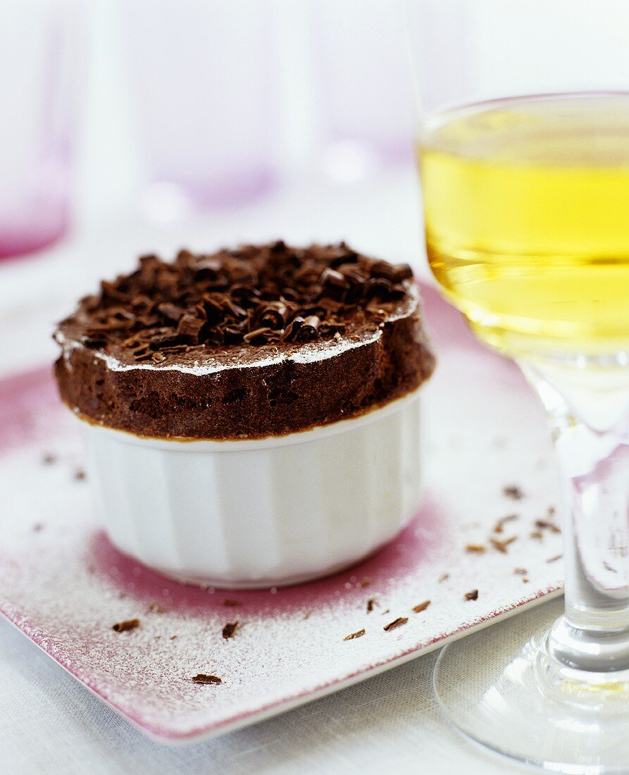 A chocolate soufflé with dessert wine