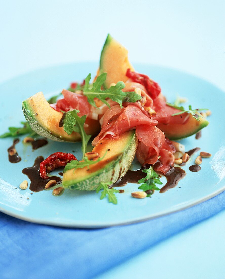 Melon with Parma ham, rocket and balsamic dressing