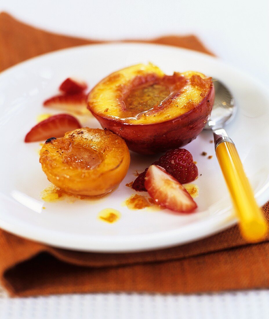 Roasted peach and apricot with strawberries