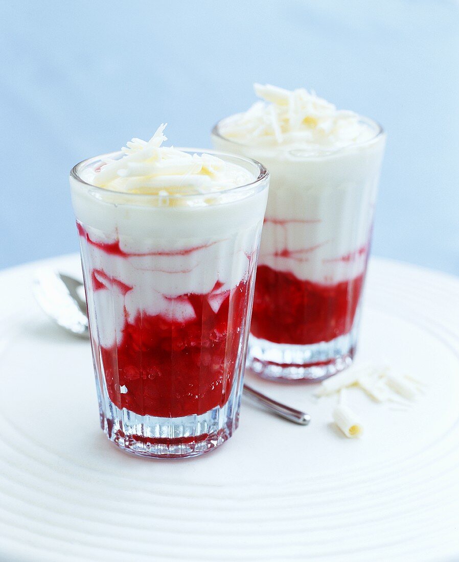 White chocolate mousse with strawberries in two glasses