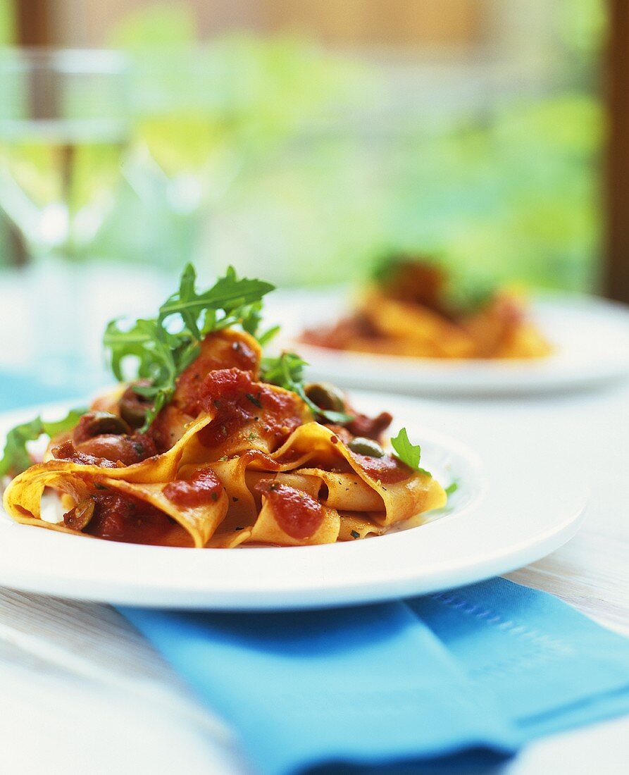 Pappardelle with tomatoes, olives and rocket