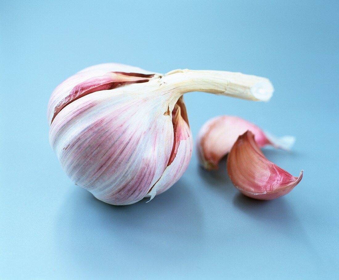 A bulb of garlic with unpeeled cloves